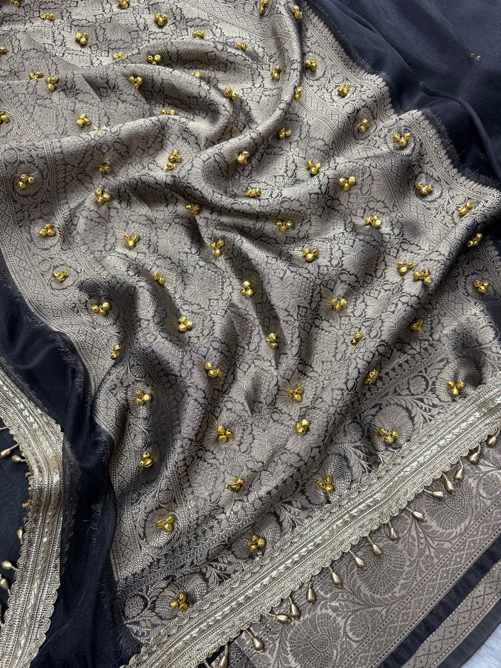 Black Tissue Silk Saree With Golden Ghungroo Butti Work & Luxury Lace Border