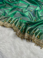Emerald Green Tissue Silk Saree With Golden Ghungroo Butti Work & Luxury Lace Border