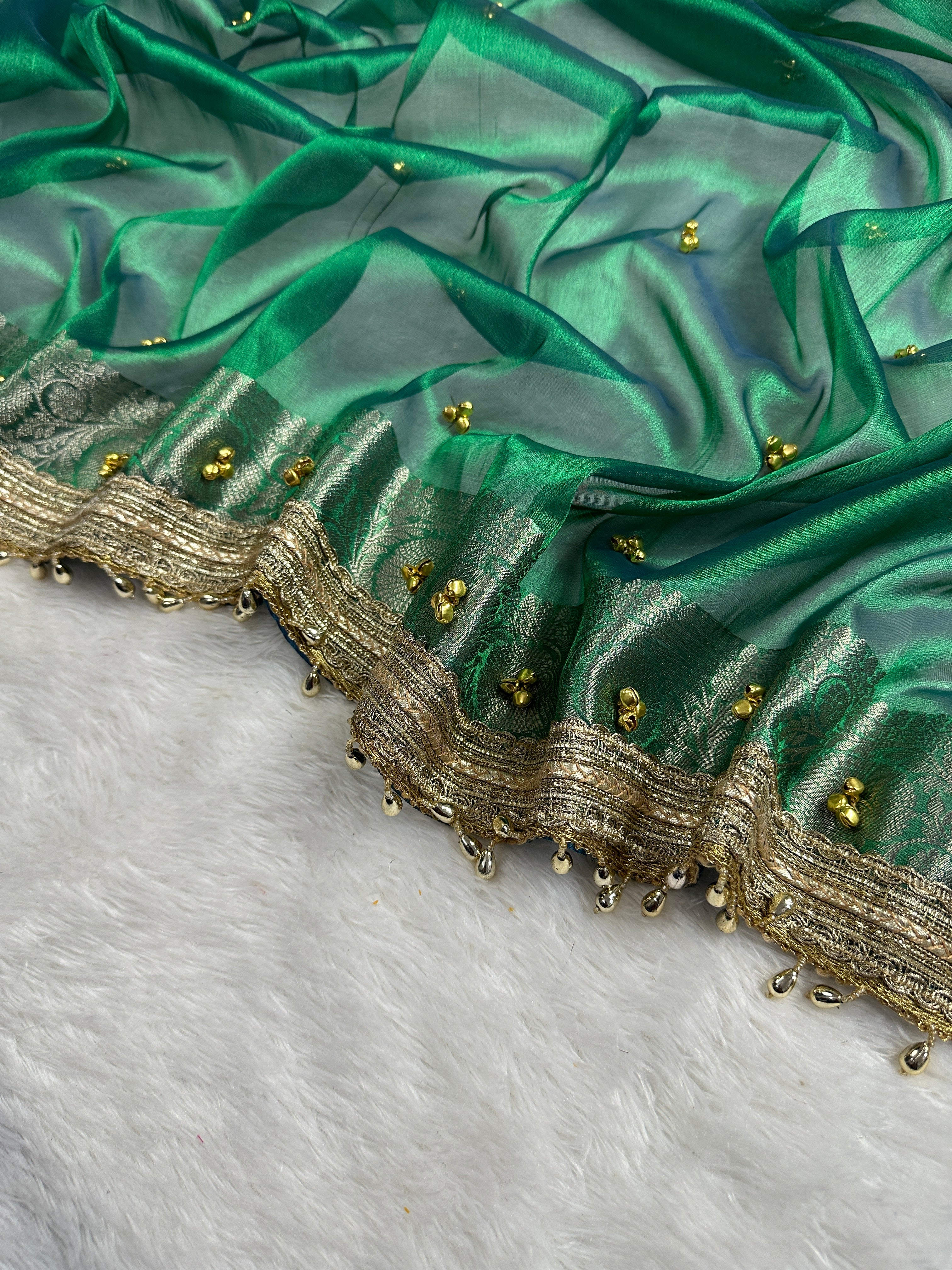 Emerald Green Tissue Silk Saree With Golden Ghungroo Butti Work & Luxury Lace Border