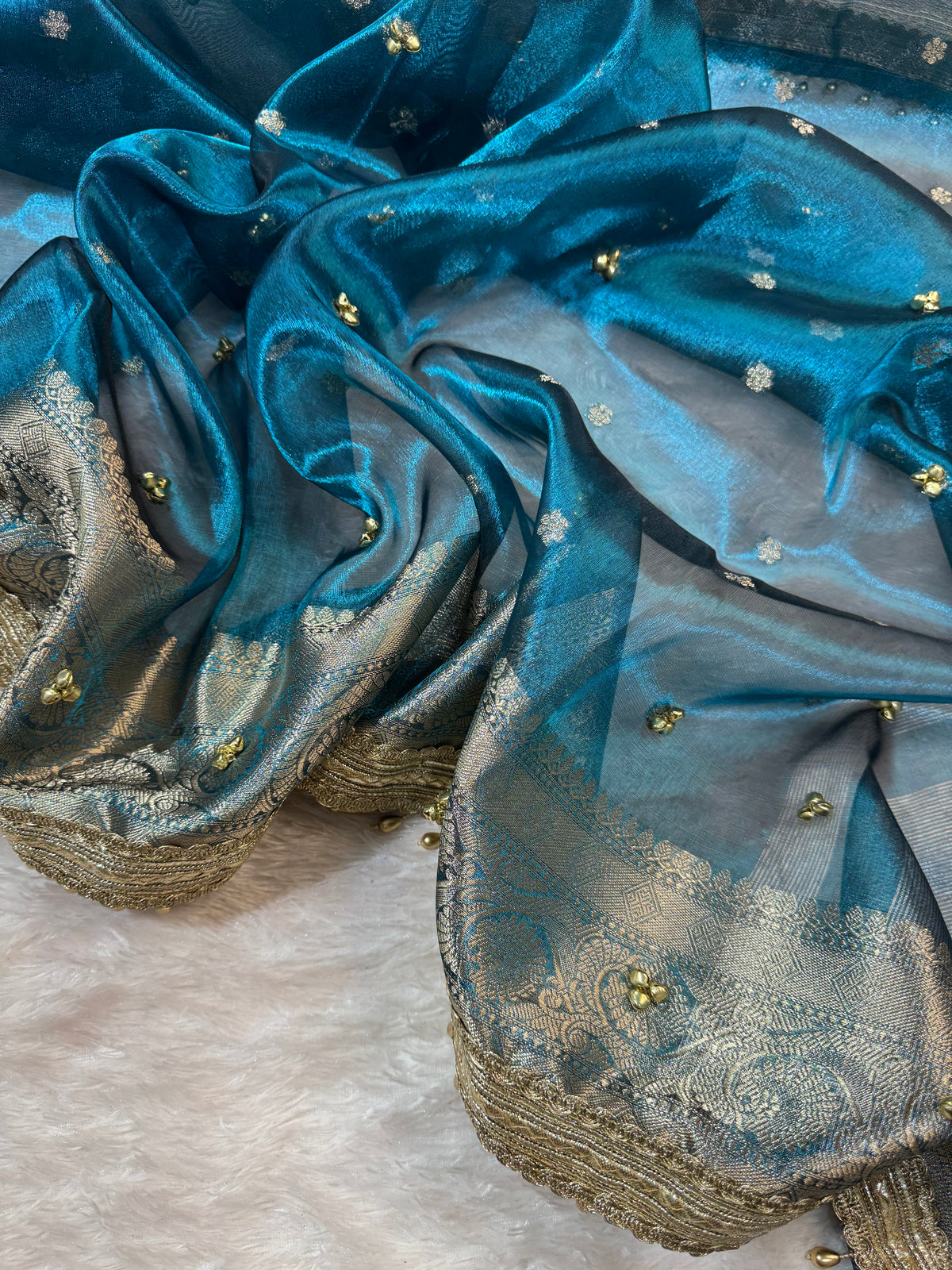 Ocean Tissue Silk Saree With Golden Ghungroo Butti Work & Luxury Lace Border