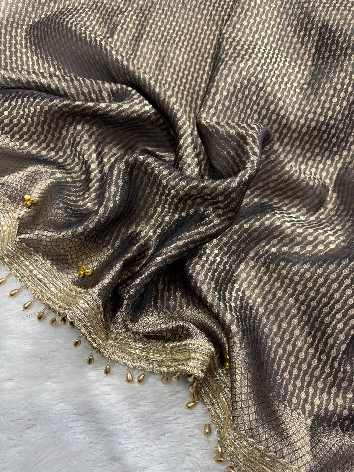 Black Tissue Silk Saree With Golden Ghungroo Butti Work & Luxury Lace Border