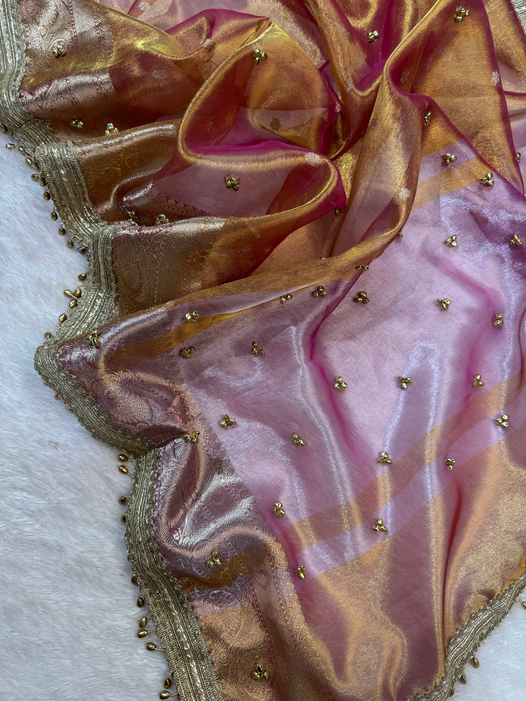 Rose Gold Tissue Silk Saree With Golden Ghungroo Butti Work & Luxury Lace Border