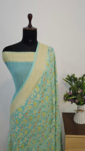 Powder Blue Handbrush Meenakari Pure Khaddi Georgette Silk Banarasi Saree
