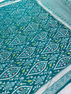 Teal Green Pure Tusser Georgette With Floral Meenakari Jall Banarasi Saree