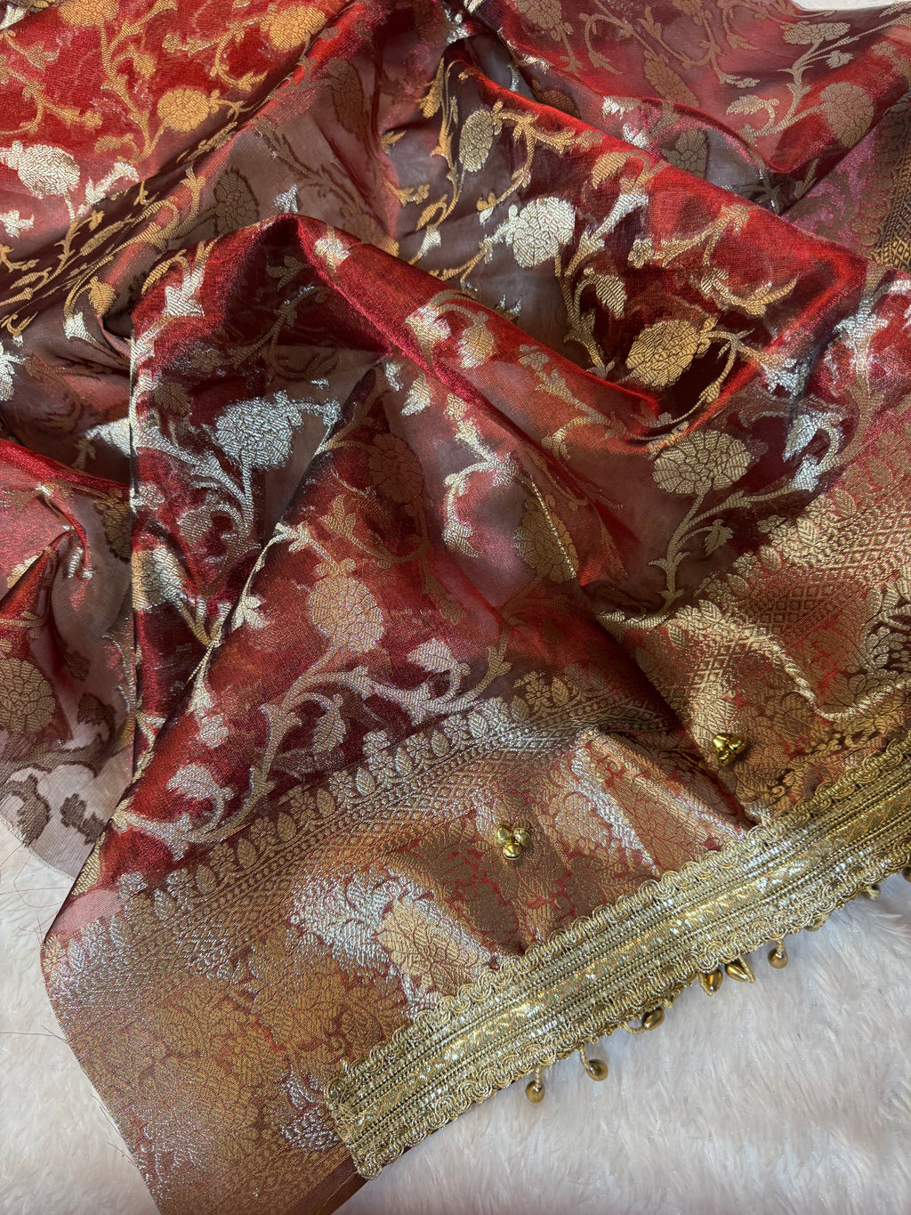 Carmine Red Tissue Silk Saree With Golden Ghungroo Butti Work & Luxury Lace Border