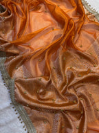 Orange Tissue Silk Saree With Golden Ghungroo Butti Work & Luxury Lace Border