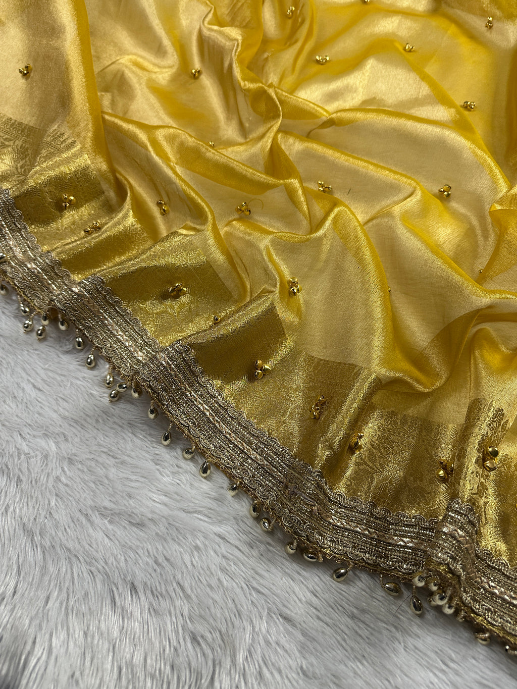 Yellow Tissue Silk Saree With Golden Ghungroo Butti Work & Luxury Lace Border