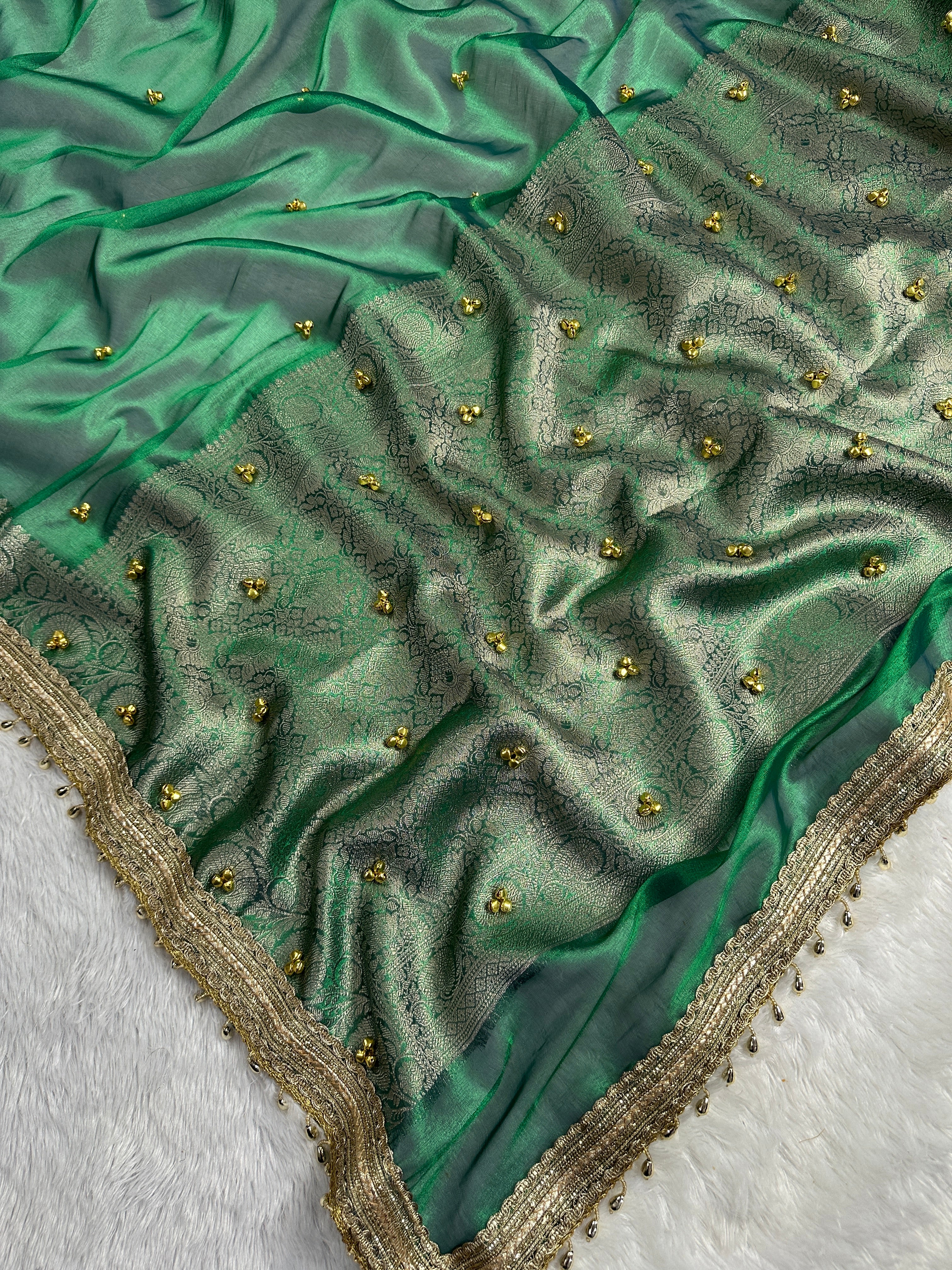 Emerald Green Tissue Silk Saree With Golden Ghungroo Butti Work & Luxury Lace Border