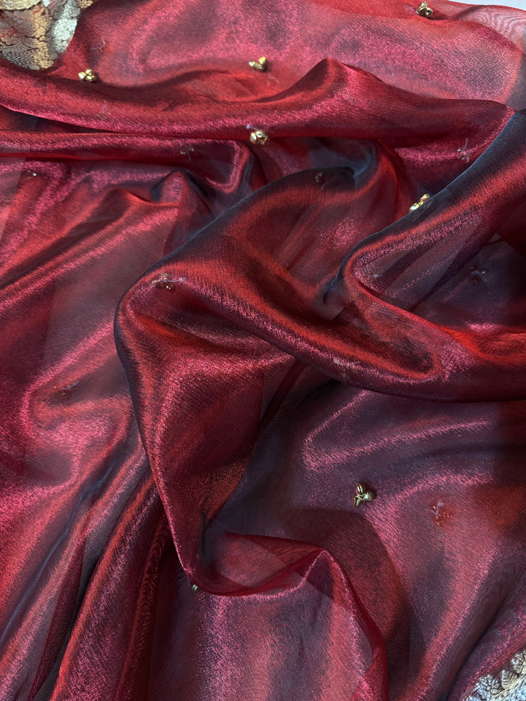 Carmine Red Tissue Silk Saree With Golden Ghungroo Butti Work & Luxury Lace Border