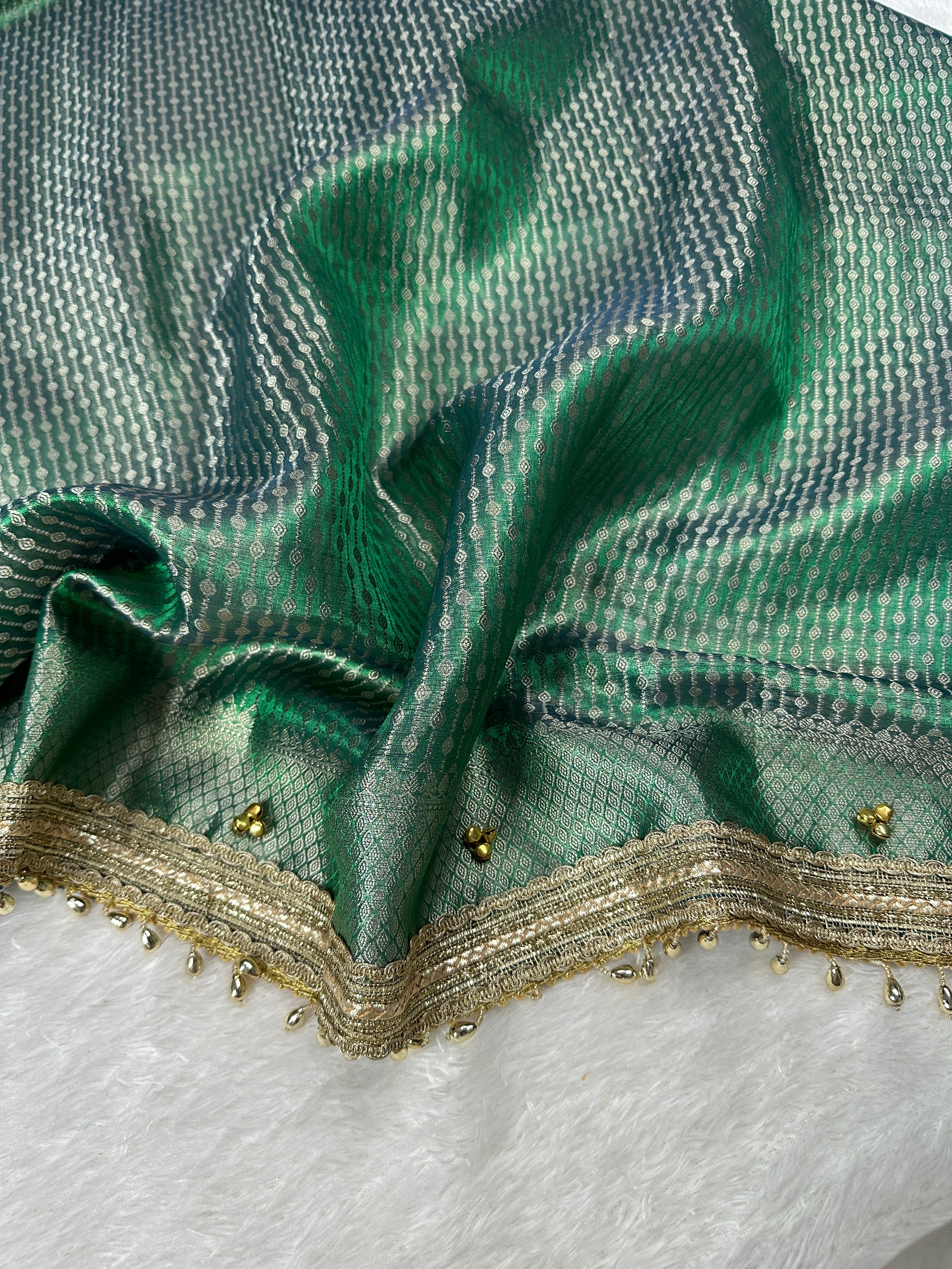Emerald Green Tissue Silk Saree With Golden Ghungroo Butti Work & Luxury Lace Border