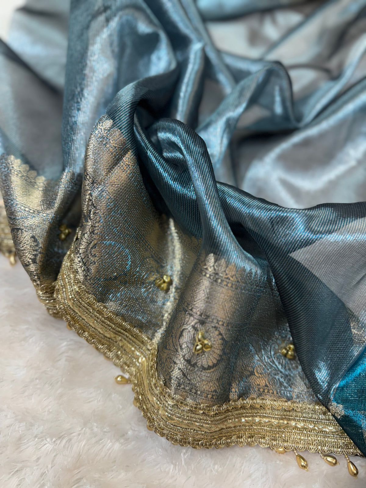 Ocean Tissue Silk Saree With Golden Ghungroo Butti Work & Luxury Lace Border